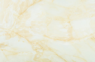 Closeup surface abstract marble pattern at yellow marble stone wall texture background