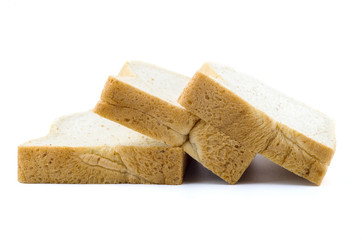 sliced whole wheat bread on white background.