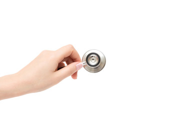 Female hand holds stethoscope on a white background.