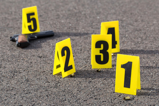 ID tents at crime scene after gunfight