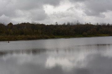 autumn cloudy gray river landscape