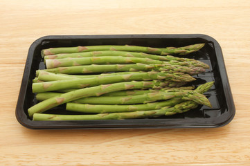 Asparagus spears in a tray