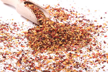 scattered seasoning on a white background