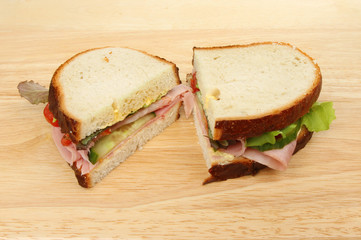 Sandwich halves on wood
