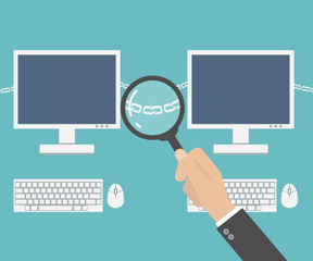 hand with magnifier analyzing chain