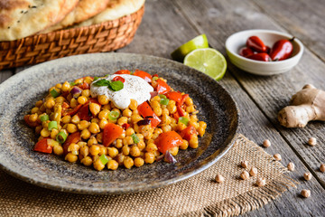 Traditional Indian Channa Masala – spicy chick peas with tomato, pepper and curry