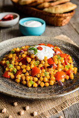 Traditional Indian Channa Masala – spicy chick peas with tomato, pepper and curry