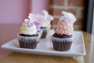 Pink White and Purple Wedding Cupcakes