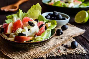 Fennel salad with grapefruit, apple, stalk celery and olives