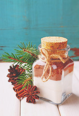 Christmas gift dry mix in a jar for cake on a white background