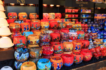 Colorful close up details of christmas fair market. Candlestick in the form of a cup