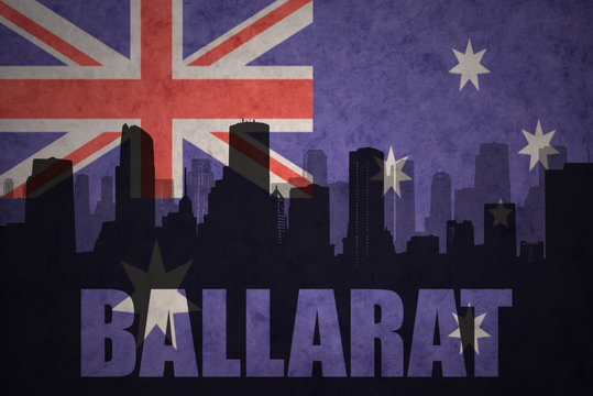 abstract silhouette of the city with text Ballarat at the vintage australian flag