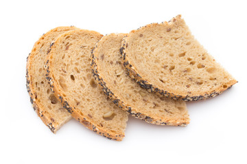 White bread sliced wholegrain bread on a wooden table.