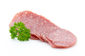 Salami smoked sausages slices isolated on white background.