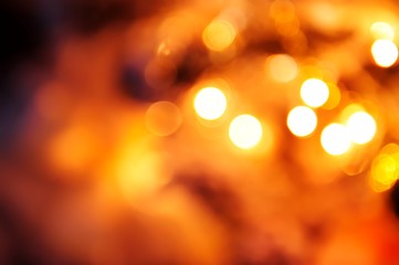 Celebratory background. / Beautiful Rasfokus lights of Christmas garlands.