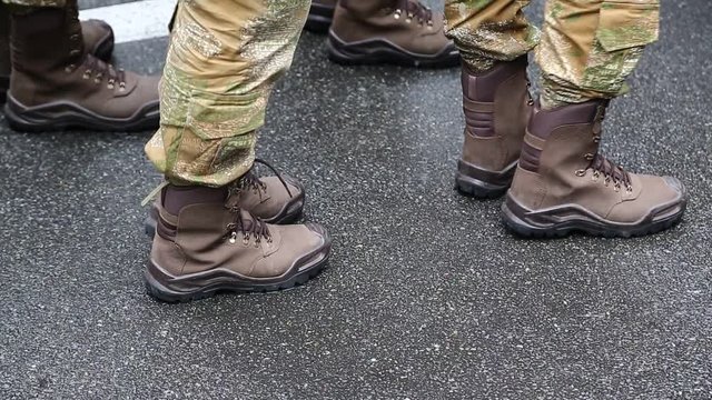 Feet of soldiers. Servicemen at the military parade. Soldiers in military uniform

