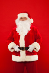 Photo of happy Santa Claus in eyeglasses looking at camera