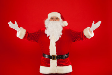 santa claus with hands up Merry Christmas.
