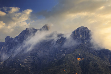 mount kinabalu covered in clouds,  sabah, malaysia