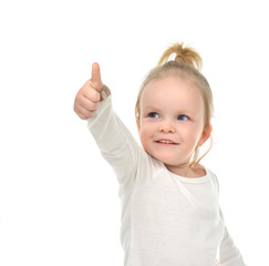 Child baby girl happy looking up smiling with hand thumb up sign