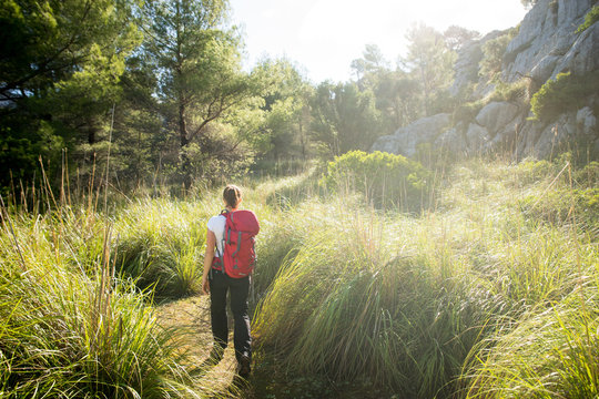 Young Woman Hiking In The Backcountry Of Mallorca, Spain