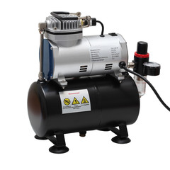 Portable car air compressor. Compressor on white background