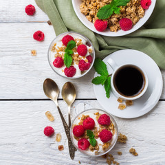 Breakfast concept. Coffee muesli granola berries homemade yogurt