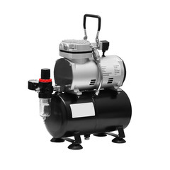 Portable car air compressor. Compressor on white background