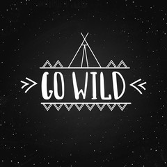 Go wild - vector hand drawn poster. Motivation phrase. Hand lettering illustration on the chalkboard
