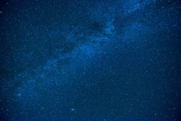 Foto op Canvas Blauwe donkere nachtelijke hemel met veel sterren © Pavlo Vakhrushev