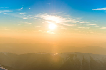 Sunset over hills and mountains