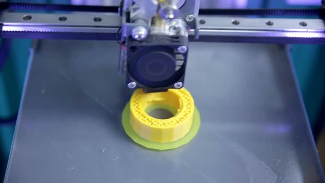 3D Printer. Printing with Plastic Wire Filament on 3D printer. HD.