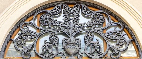 Forged elements on a large gothic door detail