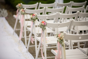 Wedding ceremony place sitting. Chairs for wedding guests