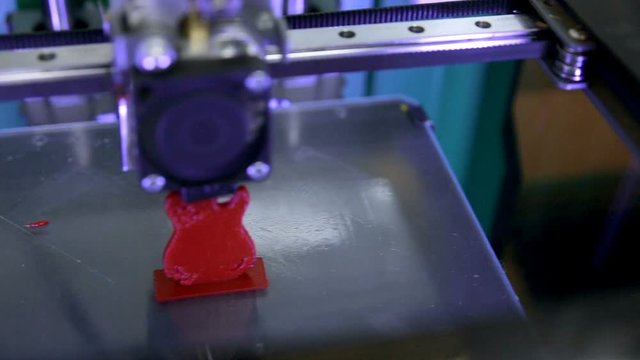 3D Printer. Printing with Plastic Wire Filament on 3D printer. HD.