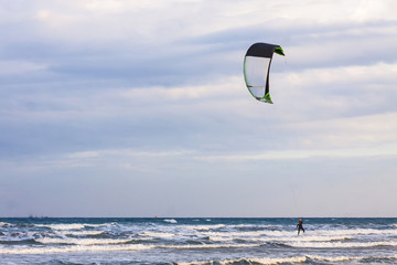 Fototapeta na wymiar Kitesurfing on a Lady's Mile beach, Limassol, Cyprus