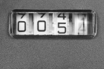 Old mechanical counter. Black and white image