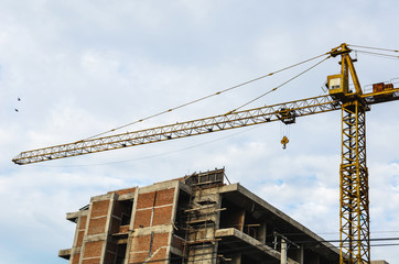 Crane and building construction site