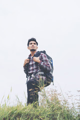 Young traveler man with backpack.