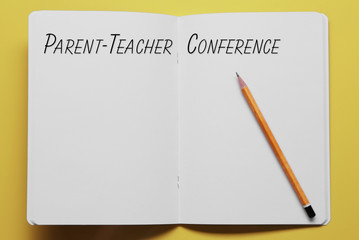 Text PARENT-TEACHER CONFERENCE written in notebook. Yellow background. School concept.