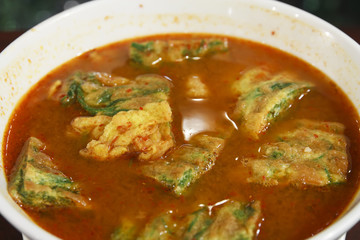 closeup vegetable sour soup with acacia pennata omelette and shr