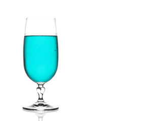 front view blue hawaii cocktail in clear glass with steam on whi