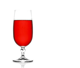 front view red wine chilled in clear glass with steam on white