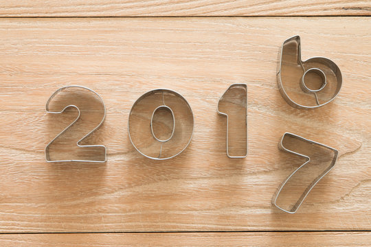 New Year 2017 on a wood background