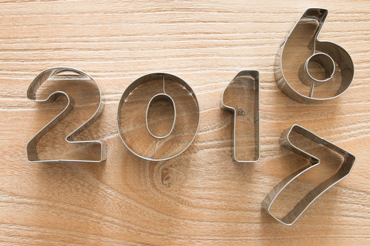 New Year 2017 on a wood background