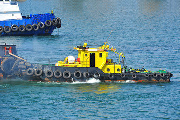 Tugboat in harbor quayside