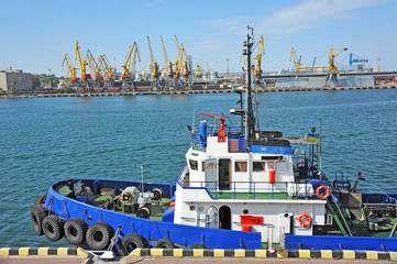 Tugboat in harbor quayside