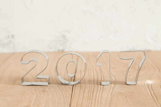 New Year 2017 on a wood background