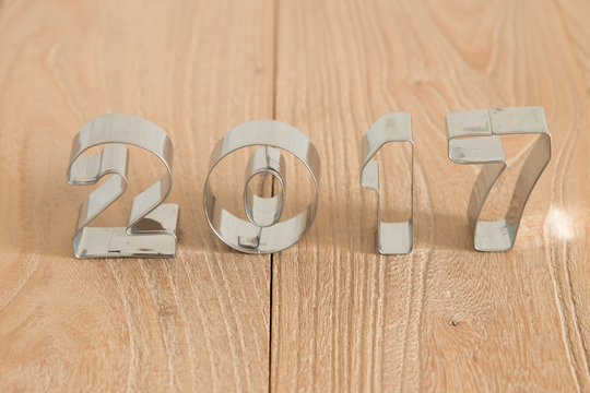New Year 2017 on a wood background