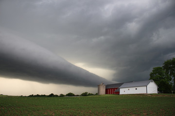 A eerie roll cloud approaches a small Wisconsin farm.